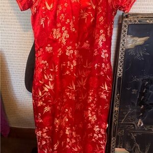 Vibrant Red Dress with Gold Accents